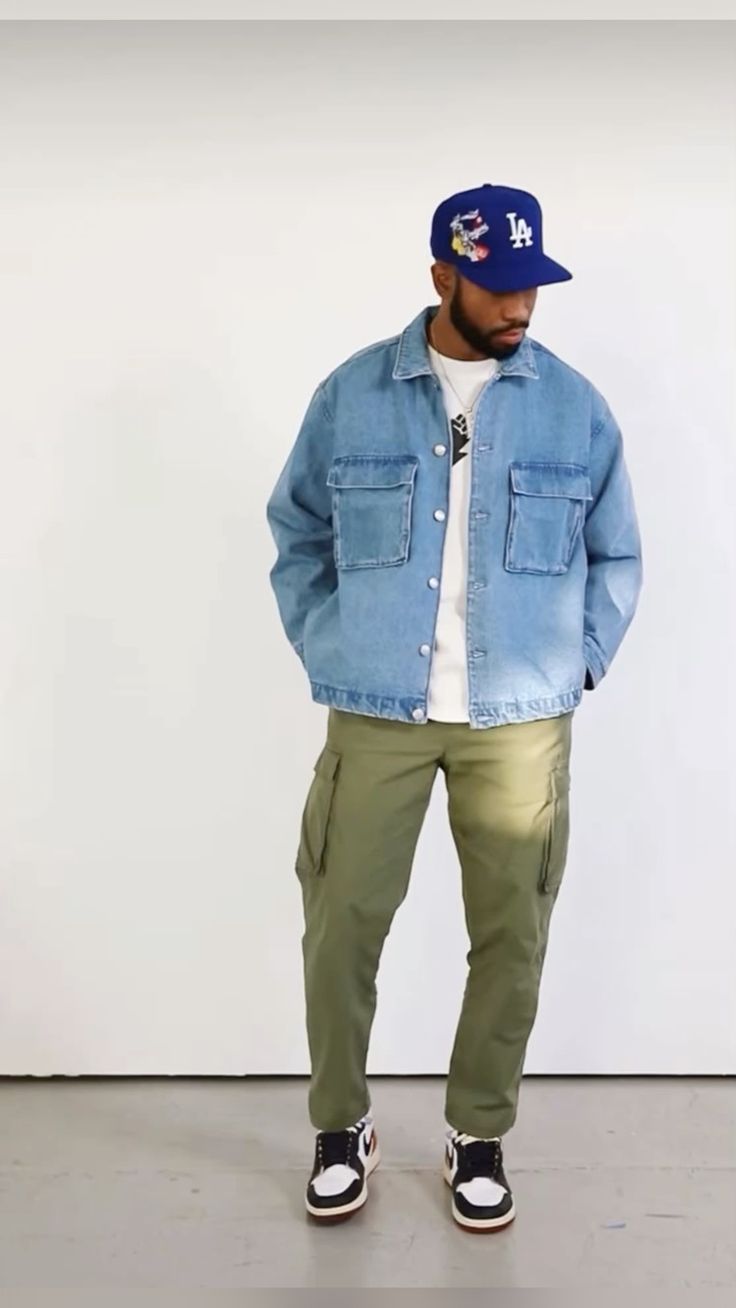 Blue denim jacket over a white tee, olive green cargo pants